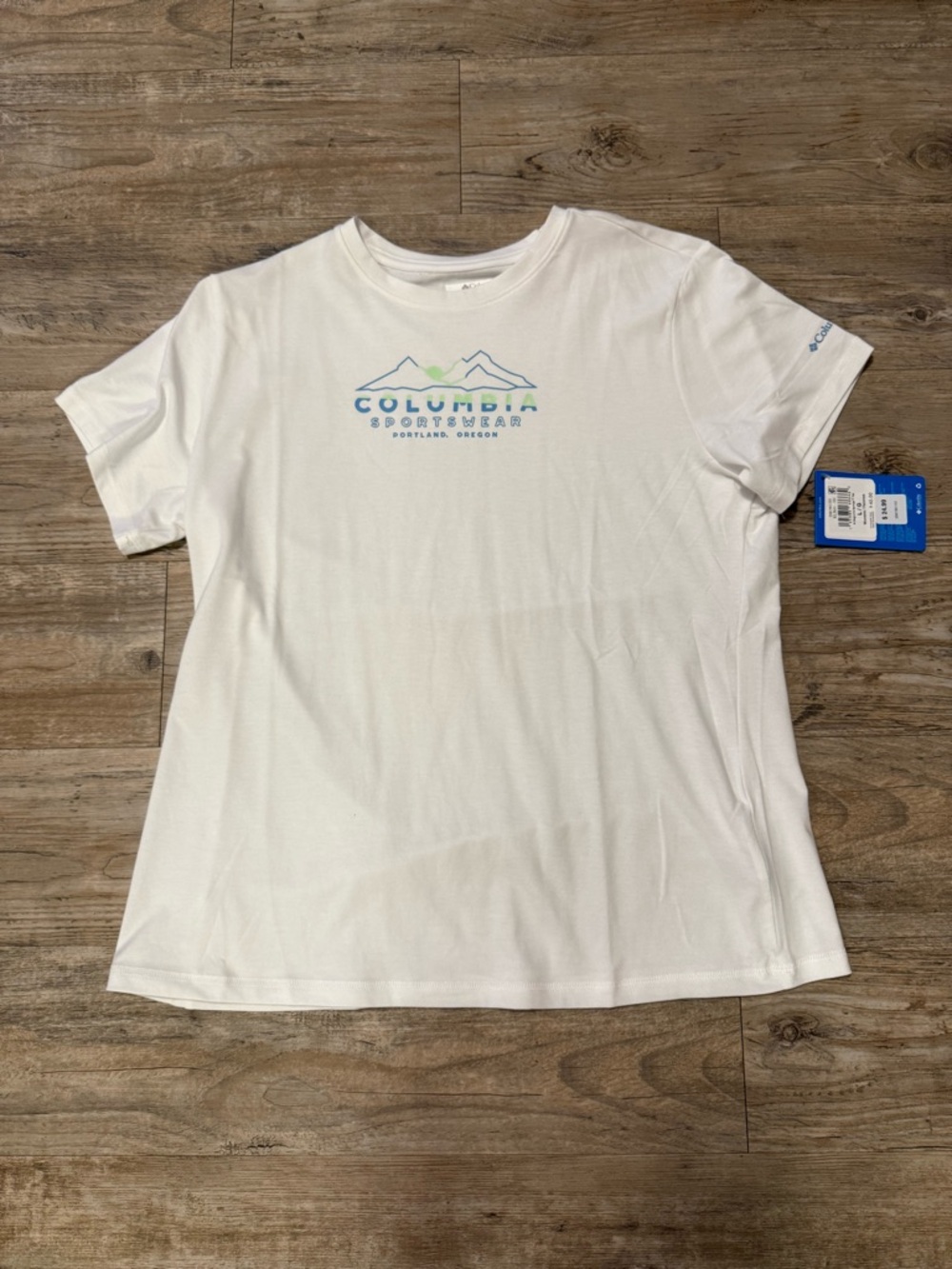 Columbia White Short Sleeve Logo Omni-Shade Tee with Blue and Green Accents